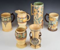 Six Art Deco Royal Cauldon jugs, tankards and vases, tallest 28cm