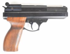 BSA 240 Magnum .22 air pistol with shaped wooden grips and adjustable trigger and sights, serial