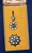 The Most Blessed Order of Loyalty to the State of Brunei Second Class insignia comprising silver