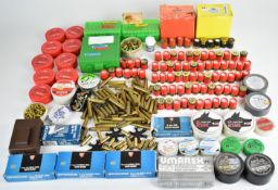 A collection of blank cartridges including 12 bore, 8mm, .22LR, .303, 9mm, Webley Target