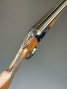 Browning 16 bore side by side ejector shotgun with named underside, chequered grip and forend,
