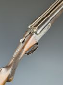 English 12 bore side by side shotgun with line engraved locks, trigger guard and fences, engraved