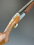 Browning Medallist Sporter 12 bore over and under ejector shotgun with named and ornately engraved