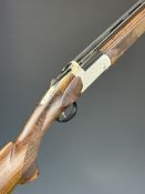 Kofs Sceptre SxE 28 bore over and under ejector shotgun with engraved locks and underside, chequered