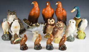 Large quantity of Beswick and Dux cat and whisky decanter figures, tallest 29cm