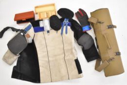 A collection of rifle shooting accessories including HSF padded shooting mat, Anschutz 110 gloves,