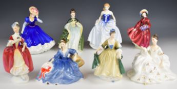 Eight Royal Doulton figures including Masquerade, Mary, Lilac Time, etc, tallest 24cm