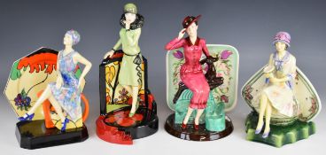 Four Kevin Francis figures comprising Charlotte Rhead, Susie Cooper, Tea with Clarice Cliff, and