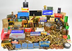 A very large collection of mainly rifle cartridges and cartridge cases including 7.62, 9mm,