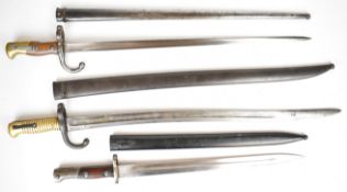 Three French / Belgian bayonets comprising French Gris bayonet, 52cm blade stamped 1877 to back of