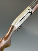 Remington Model 1100 12 bore 3-shot semi-automatic shotgun with ornately carved and chequered semi-