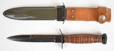 American M3 fighting knife in plastic scabbard with leather frog, overall length 32cm. PLEASE