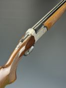 Sportsmarketing Maestro 20 bore over and under ejector shotgun with engraved locks, underside,