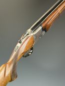 Laurona 12 bore over and under ejector shotgun with engraved hunting scenes and birds to the