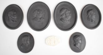 19thC Grand Tour black basalt / Jasperware plaques, possibly Wedgwood, decorated with relief moulded