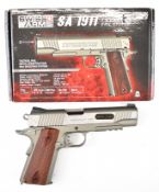 Swiss Arms SA 1911 .177 CO2 air pistol with chequered faux wooden grips, multi-shot magazine and