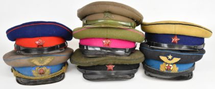 Seven Russian / Soviet Union peaked military hats