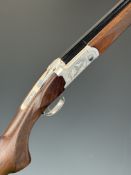Yildiz .410 over and under ejector shotgun with engraved scenes of dogs and birds to the named locks
