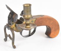 Flintlock tinder lighter pistol with engraved brass action, steel trigger guard and shaped wooden