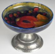 Moorcroft tazza decorated in the Pomegranate pattern, with pewter mount, H9.5cm, D13cm