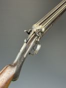 Thomas Wild 12 bore side by side hammer action shotgun with chequered semi-pistol grip and horn