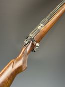 CZ 452-2E ZKM .22 bolt-action rifle with chequered semi-pistol grip and 21 inch barrel, overall