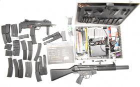 A collection of airsoft guns and accessories including Galaxy G-7 submachine gun, an assault style