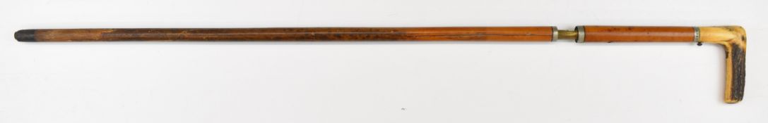 Eclipse 8mm walking stick shotgun with stag antler handle, graduated cane, twist and pull breech,