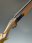 Browning B26 12 bore over and under ejector shotgun with chequered semi-pistol grip and forend,