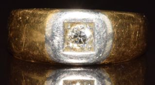 An 18ct gold ring set with an old cut diamond of approximately 0.12ct, 5.2g, size J