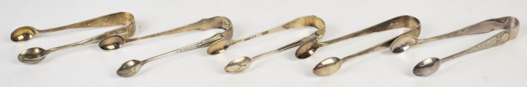 Five pairs of Victorian and later hallmarked silver sugar tongs including a Walker & Hall pair,