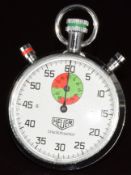 Heuer Trackmaster stopwatch ref. 8067 with red and green subsidiary dial, black Arabic numerals,