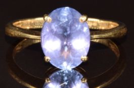 A 14k gold ring set with an oval cut tanzanite of approximately 1.6ct, 2.6g, size N