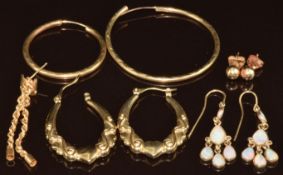 A pair of 9ct gold earrings set with opals, two further pairs of 9ct gold earrings (1.9g) and