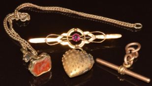 Victorian 15ct gold heart locket (2.2g), yellow metal T bar (3.7g), pocket watch key set with an