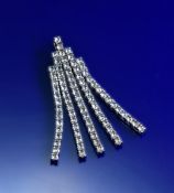 An 18ct white gold Art Deco style pendant set with seventy-eight rose cut diamonds, total diamond