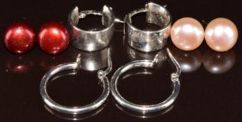 A pair of 9ct white gold hoop earrings (1.8g), two pairs of 9k gold earrings set red and pink pearls