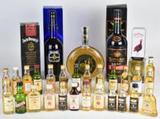 A group of mixed alcohol comprising Jack Daniel's Sour Mash Whiskey, Napoleon Bardinet VSOP