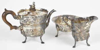 Victorian hallmarked silver three piece tea set comprising teapot, sugar bowl and milk jug, all with
