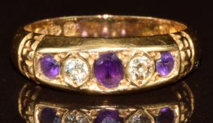 An 18ct gold ring set with amethysts and diamonds, Chester 1913, 4.2g, size N