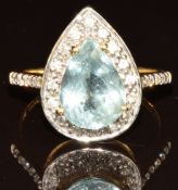 An 18k white gold ring set with a pear cut Paraiba tourmaline of approximately 2.6ct surrounded by