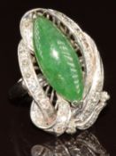 A 14k white gold ring set with a marquise cut jadeite cabochon and diamonds, 5.8g, size K