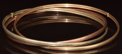 A 9ct tri-coloured bangle, 10g