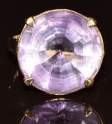 A 9ct gold ring set with a round cut amethyst, 5.5g, size K