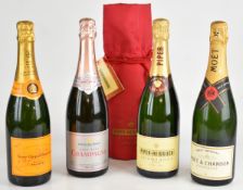 Four bottles of Champagne comprising Piper-Heidsieck, Fortnum & Mason rosé, Moët & Chandon and Veuve