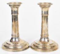Pair of modern hallmarked silver candlesticks of plain circular form, London 1998, maker John Bull