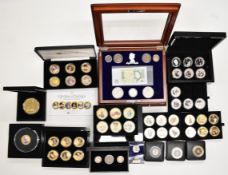 Large collection of cased and loose United Kingdom collectable coins many Her Majesty Queen