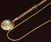A 9ct gold pendant set with turquoise and two 9ct gold chains, 8.5g