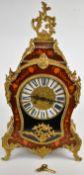 Continental brass and inlaid mantel clock with enamelled numerals, the movement impressed Franz