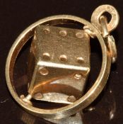 A 9ct gold charm in the form of a dice, 2.3g